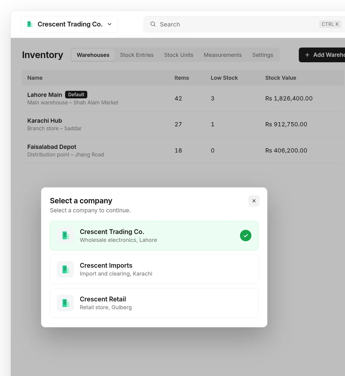 AIM “Select a company” dialog listing three companies over the Warehouses page, which shows Lahore Main (default), Karachi Hub and Faisalabad Depot with items, low stock and stock value.